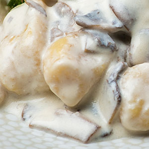 Cheese gnocchi with creamy mushroom sauce
